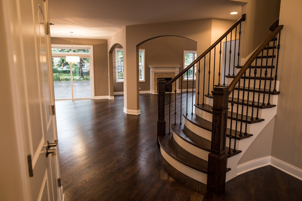 Inspiration for a mid-sized transitional wooden straight home design remodel in Chicago with painted risers