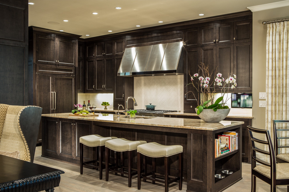 Design ideas for a traditional galley eat-in kitchen in Atlanta with shaker cabinets, dark wood cabinets, white splashback, stainless steel appliances, painted wood floors and with island.