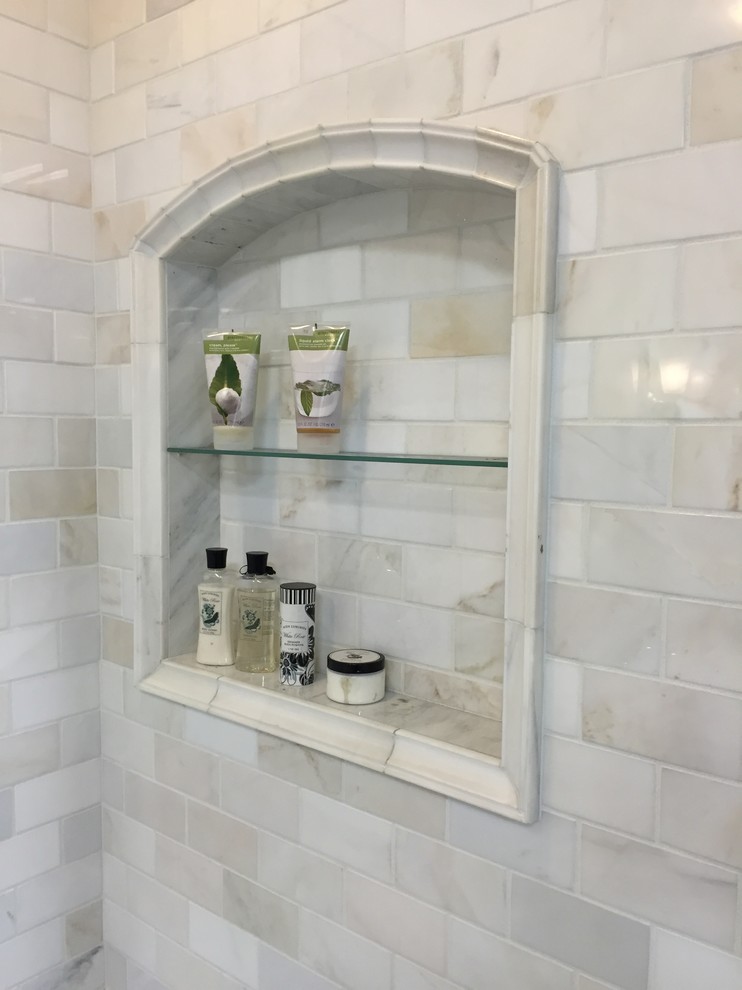 Inspiration for a mid-sized transitional 3/4 bathroom in Chicago with an open shower, black and white tile, gray tile, subway tile, blue walls and mosaic tile floors.