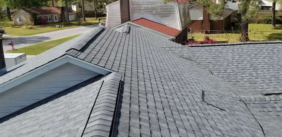 Example of a small classic gray one-story wood gable roof design with a shingle roof