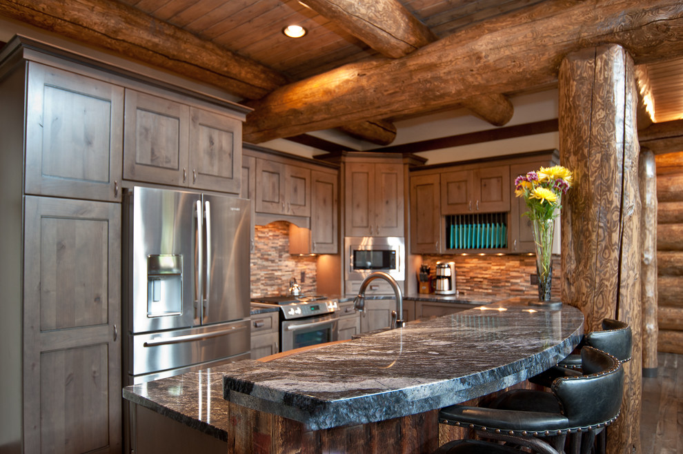 Mountain style l-shaped eat-in kitchen photo in Denver with an island