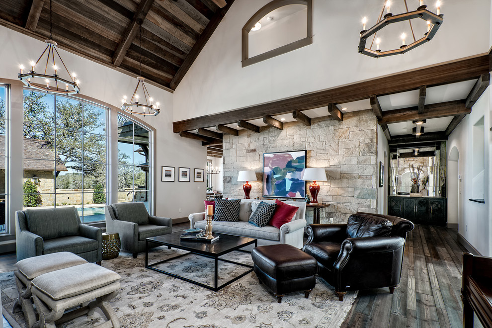 Inspiration for a country formal enclosed living room in Austin with white walls and dark hardwood floors.