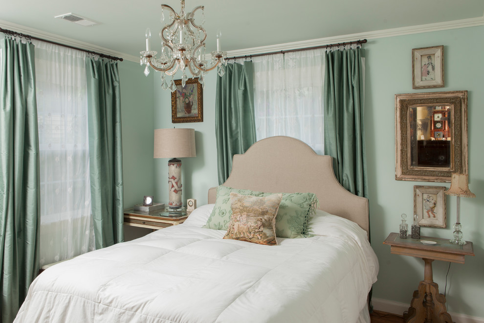 Design ideas for a traditional bedroom in Wilmington with green walls.