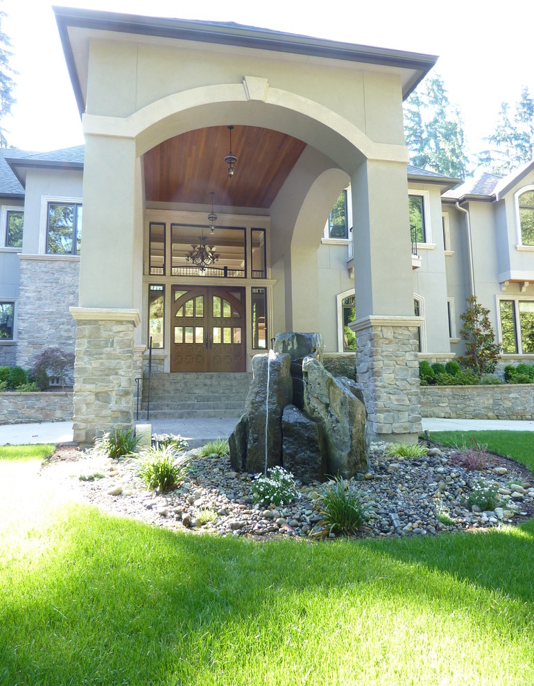Large covered driveway entrance Mediterranean Entry Seattle by