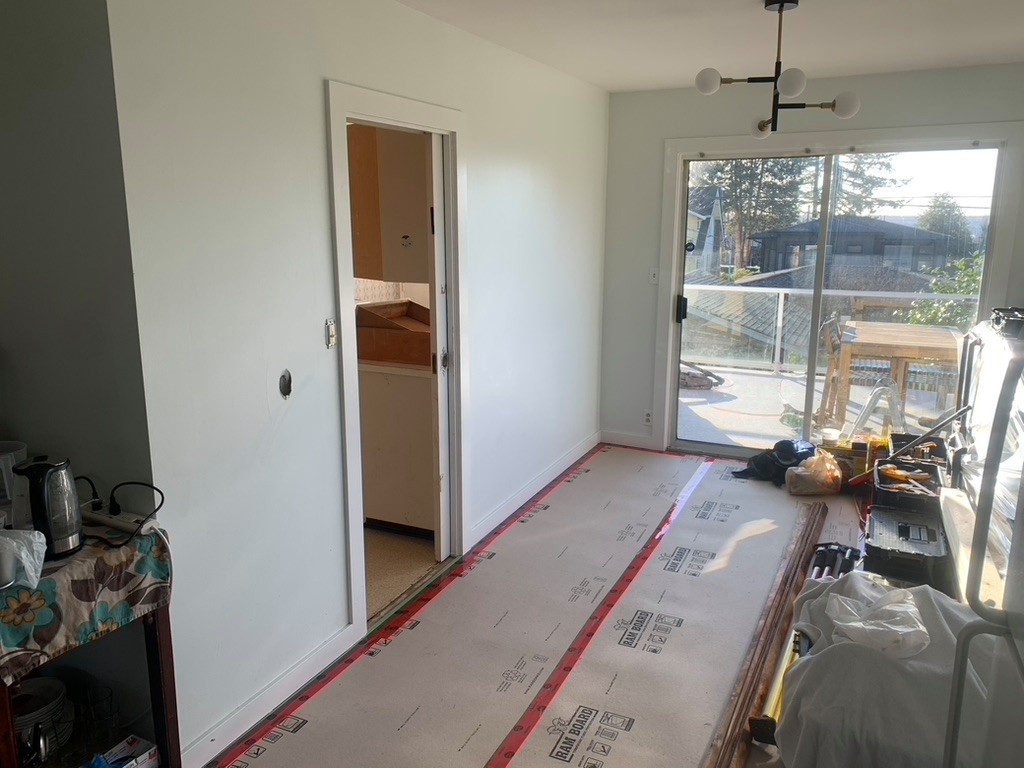 Remove wall and install beam. Install new kitchen.