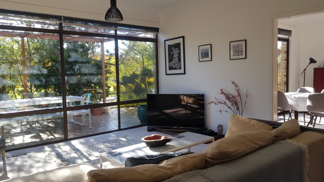 reimagined interiors midcentury-living-room