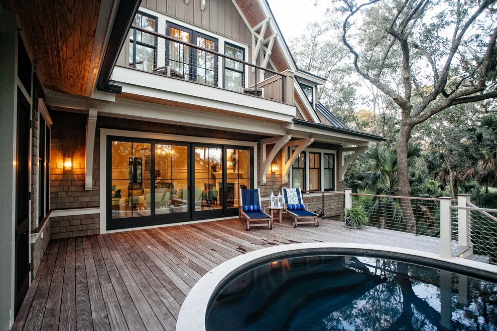 Large transitional backyard deck photo in Charleston with no cover