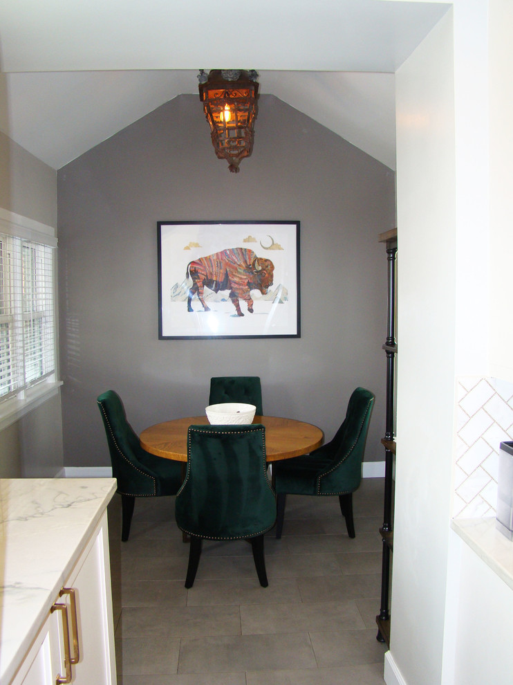 Example of a large transitional u-shaped ceramic tile and gray floor eat-in kitchen design in Denver with a double-bowl sink, recessed-panel cabinets, white cabinets, granite countertops, white backsplash, marble backsplash, stainless steel appliances, an island and multicolored countertops
