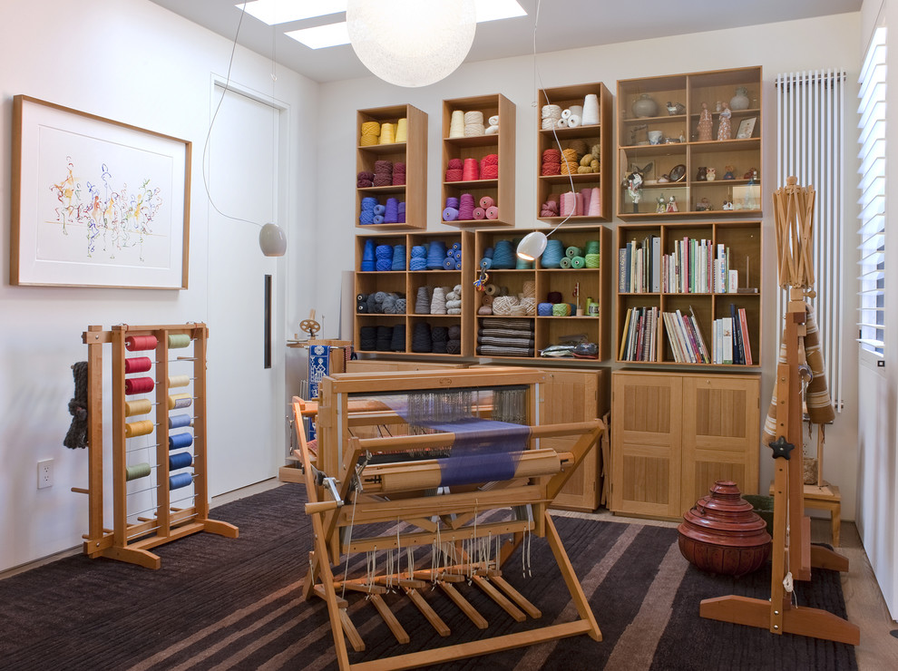 Photo of a contemporary craft room in San Francisco with white walls and carpet.