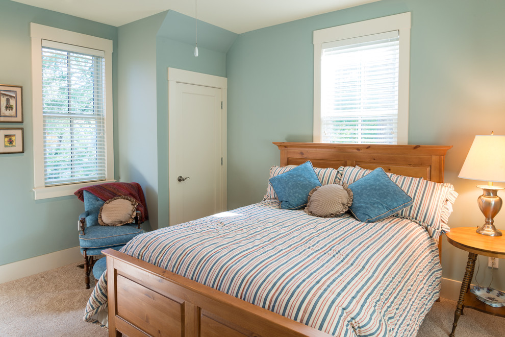 Country bedroom in Other with blue walls.