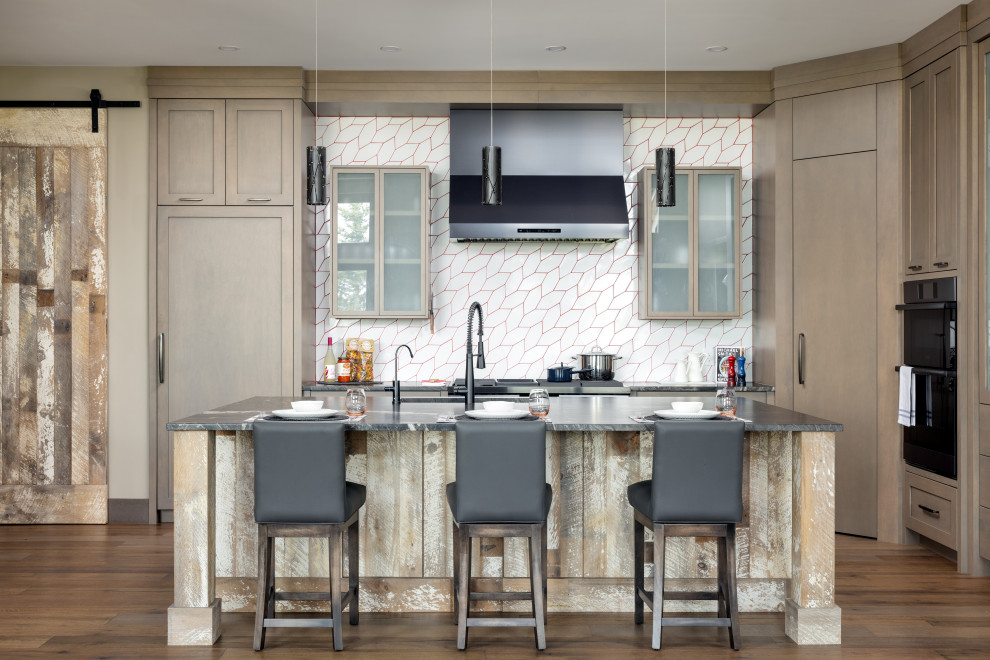 Example of a mountain style kitchen design in Calgary