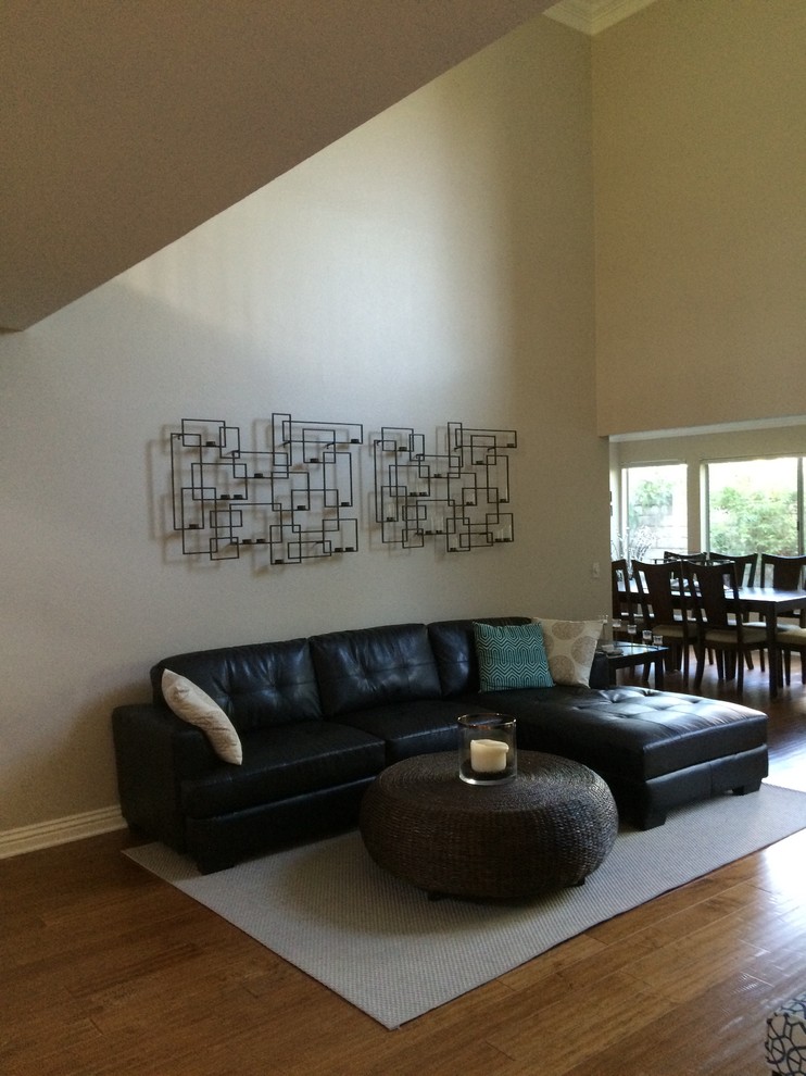 Decor for two story living room wall