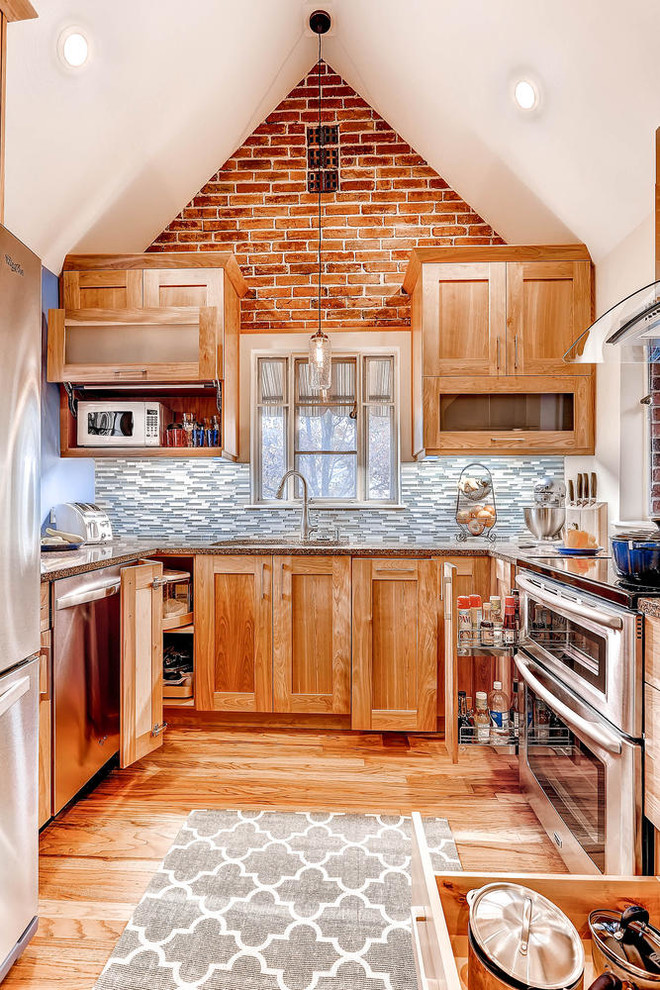 Small traditional u-shaped separate kitchen in Denver with shaker cabinets, light wood cabinets, grey splashback, stainless steel appliances, medium hardwood floors, an undermount sink, granite benchtops, glass tile splashback and no island.
