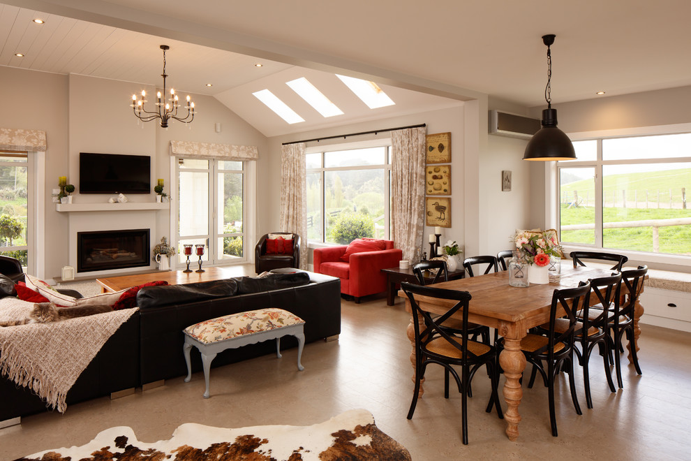 Large country open plan dining in Wellington With Beige Walls, Cork Floors, a Standard Fireplace, a Metal Fireplace Surround and Beige Floor.