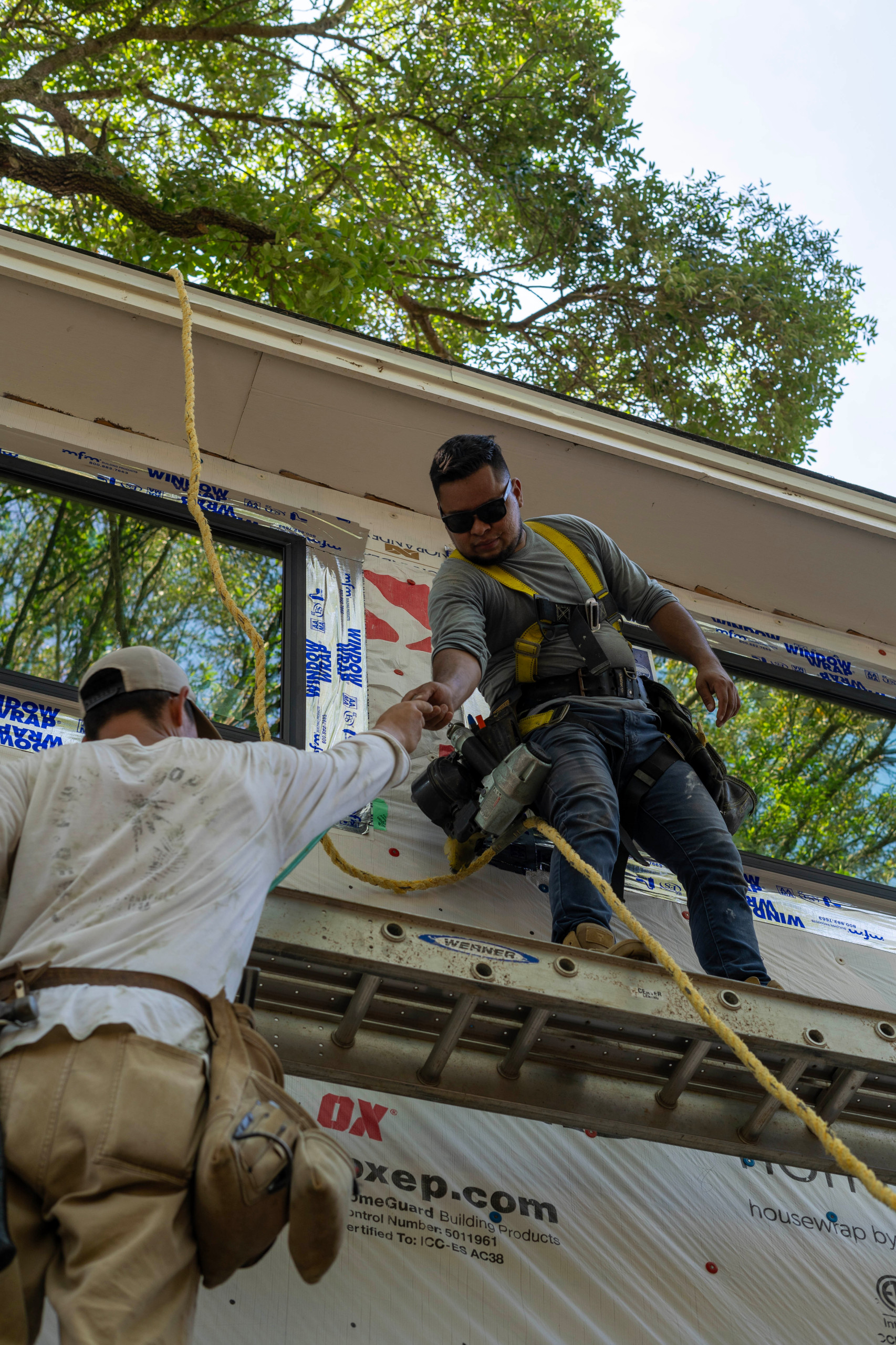 Crew working on exterior trim