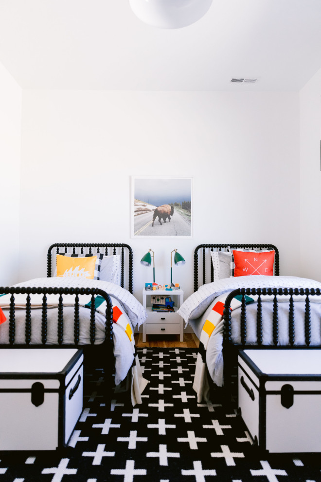 This is an example of a large country kids' room in Boise with white walls, light hardwood floors, grey floor and wood walls.