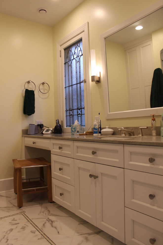 This is an example of a mid-sized transitional master bathroom in Other with an undermount sink, shaker cabinets, white cabinets and an alcove shower.