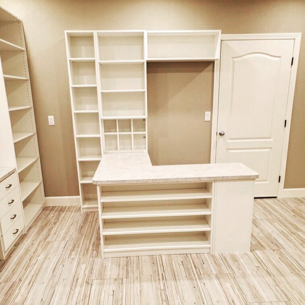 Large Craft Room - This large basement space was dreamed up by the homeowner to allow her to do many crafts with her grandkids! This was a really fun project to do - every craft has it's own placement in the room.
