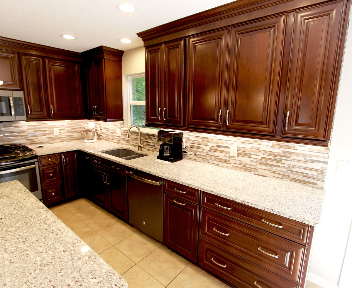 Waypoint Cherry Chocolate Cabinets And Giallo Ornamental Granite