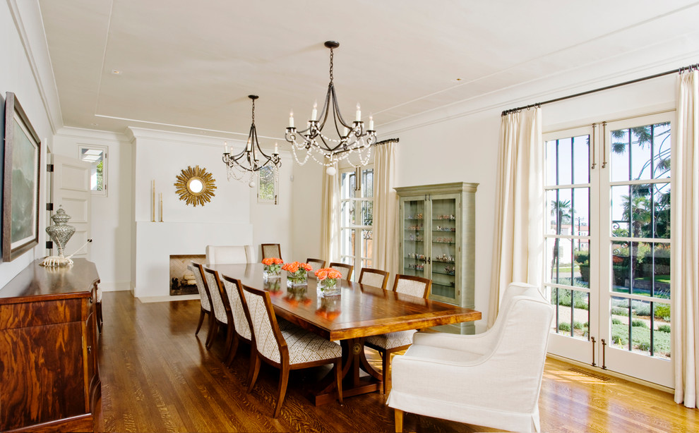 Inspiration for a traditional dining room in Santa Barbara with white walls.