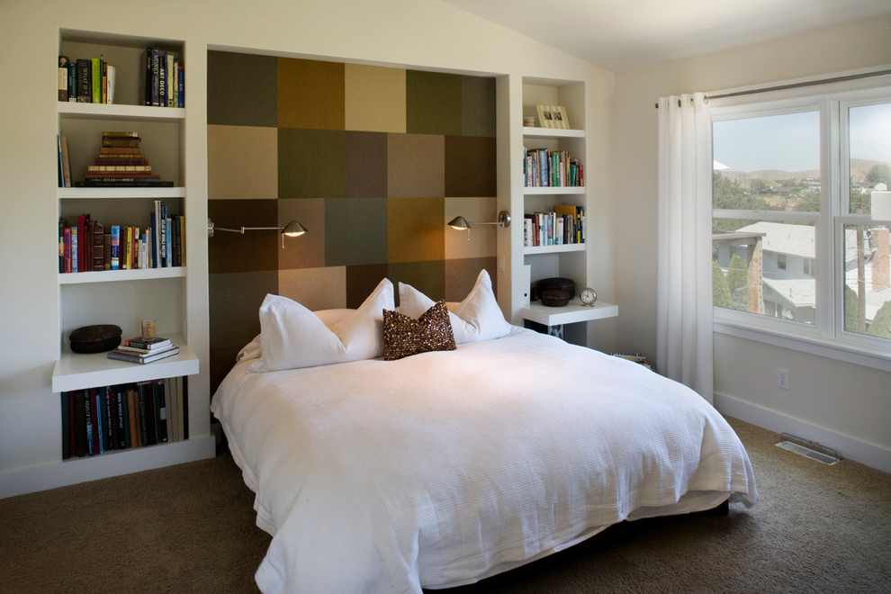 Photo of a contemporary bedroom in Boise with white walls.