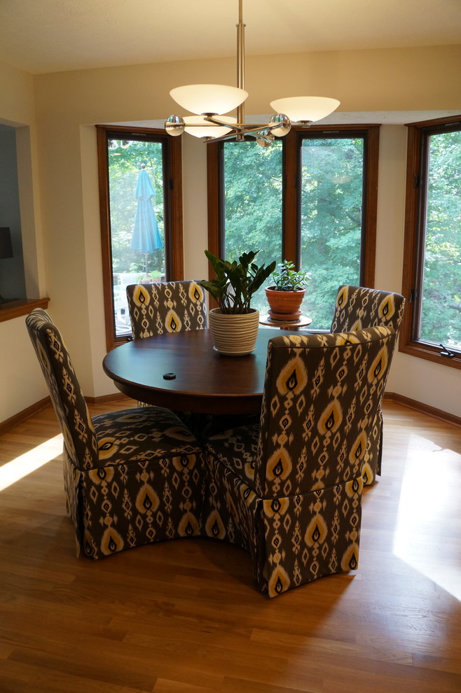 This is an example of a transitional dining room in Indianapolis.