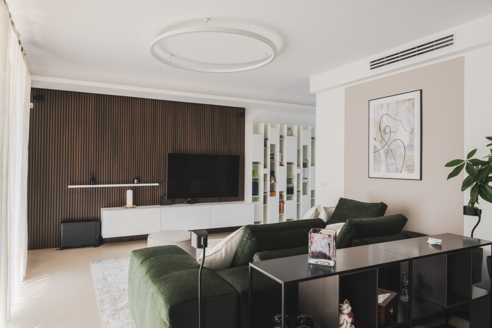 This is an example of a large urban open plan living room in Milan with a reading nook, multi-coloured walls, porcelain flooring, a built-in media unit, beige floors, a drop ceiling and wallpapered walls.
