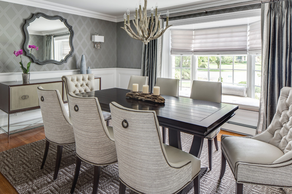 This is an example of a large contemporary separate dining room in New York with grey walls and no fireplace.