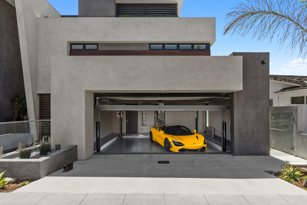 Ispirazione per un grande garage per quattro o più auto connesso contemporaneo