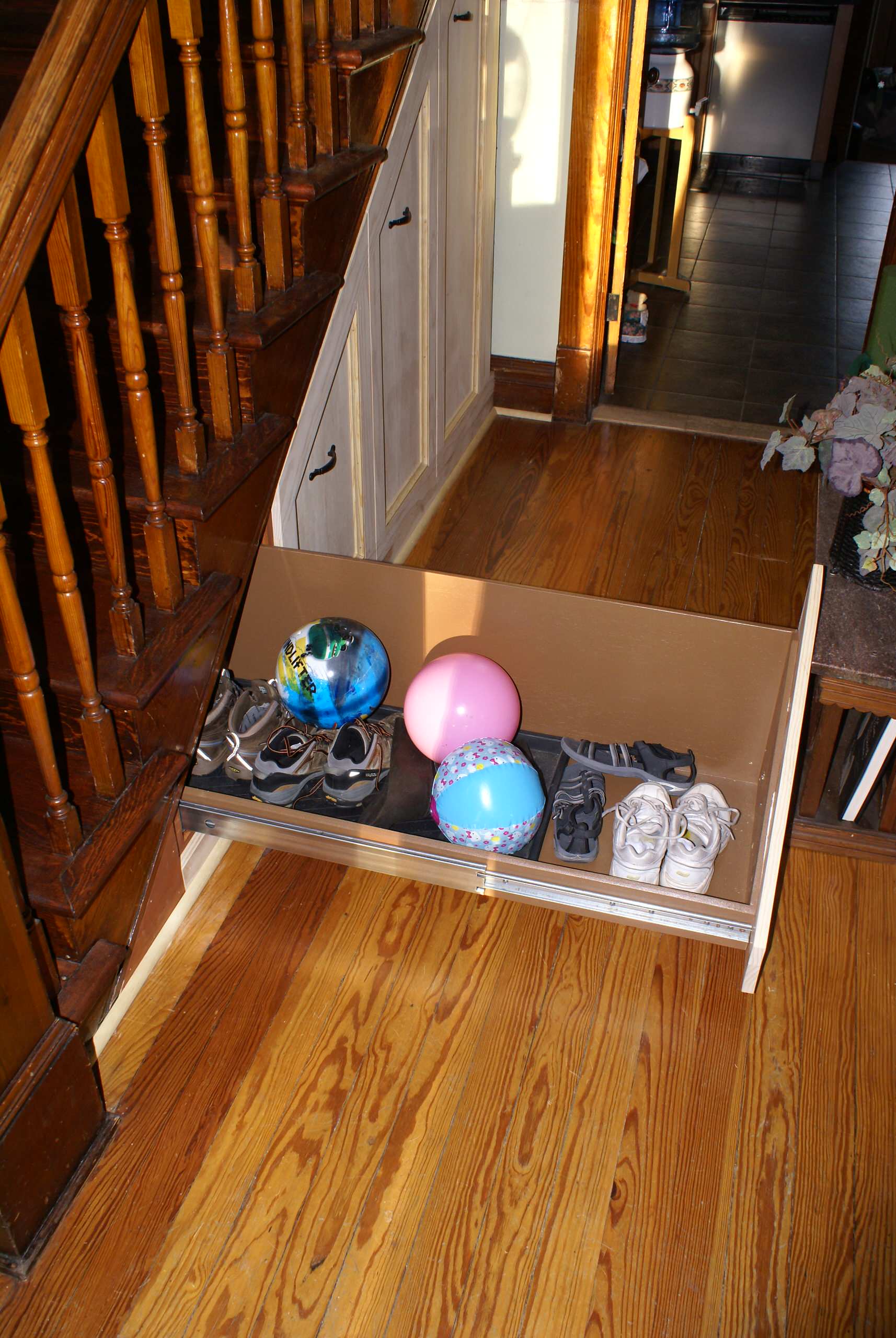 Entry hall closet built under stairs