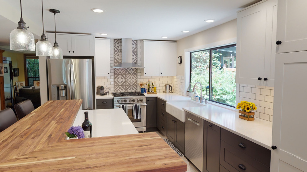 Example of a transitional kitchen design in Seattle