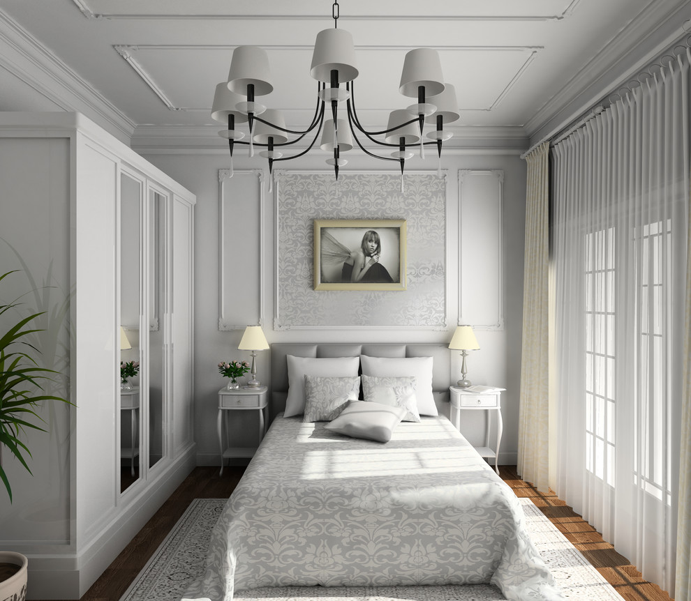 Design ideas for a traditional bedroom in Miami with white walls and medium hardwood floors.