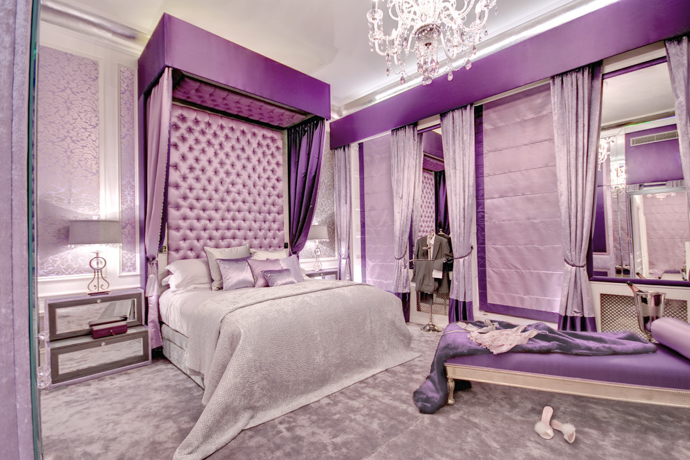 Photo of a large contemporary master bedroom in London with purple walls, carpet and no fireplace.