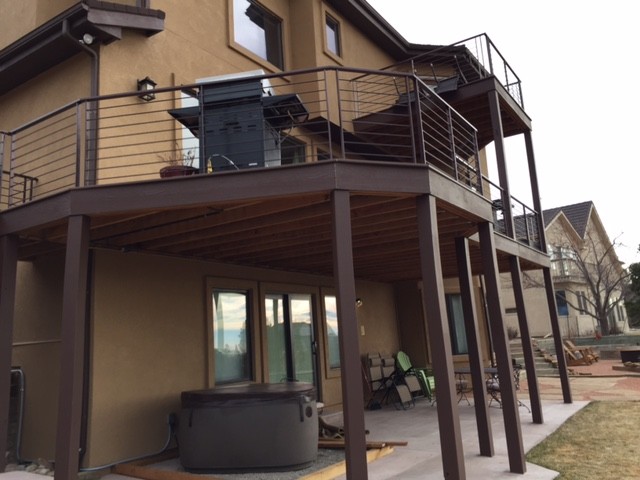 Deck - mid-sized contemporary backyard deck idea in Denver with no cover