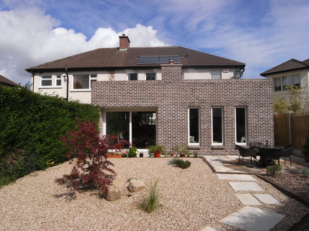 This is an example of a mid-sized modern two-storey exterior in Dublin.