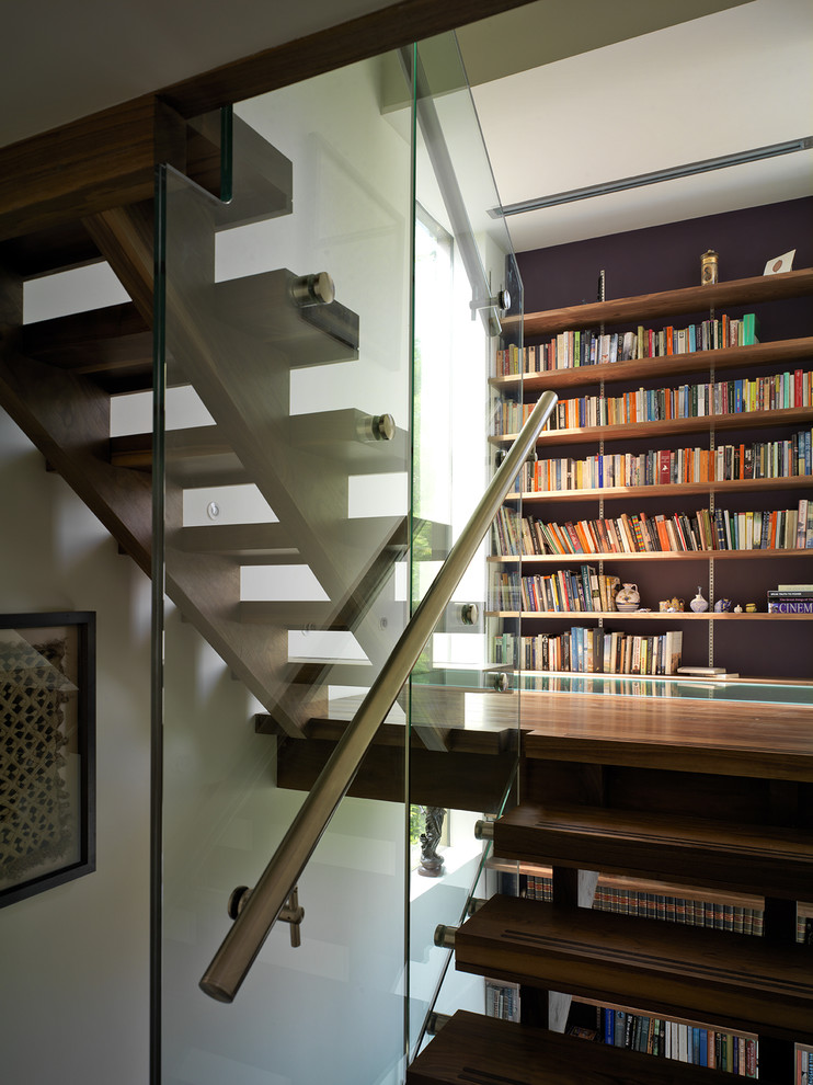 Design ideas for a contemporary staircase in London with open risers.