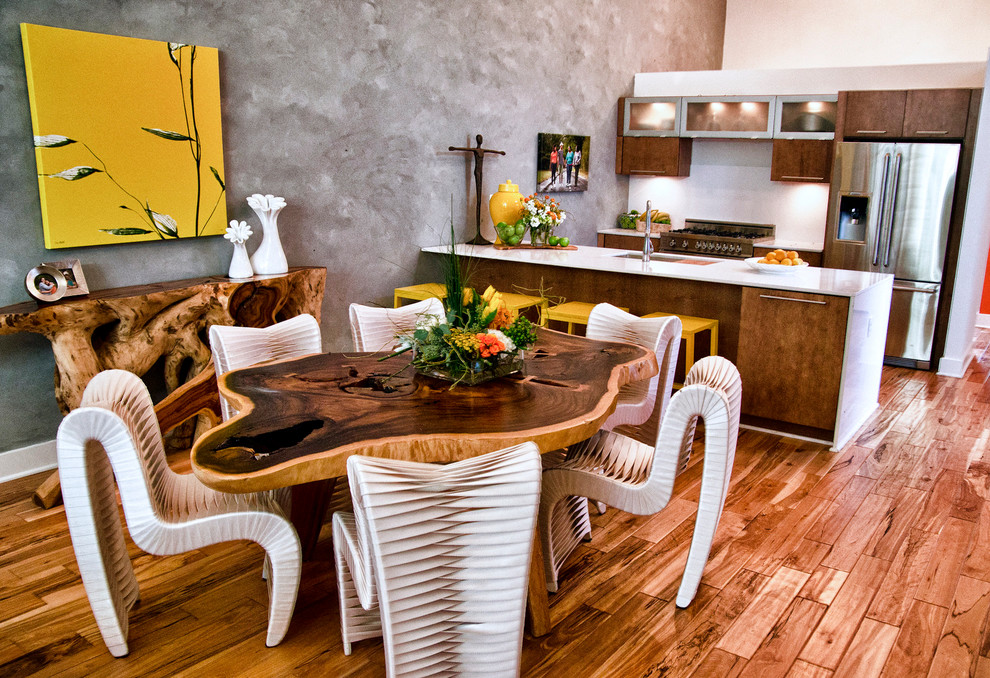 Eclectic galley eat-in kitchen in Austin with stainless steel appliances.