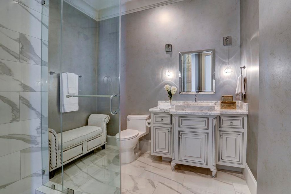 Design ideas for a mid-sized contemporary powder room in Houston with furniture-like cabinets, grey cabinets, white tile, marble, grey walls, marble floors, an integrated sink, marble benchtops, white floor and white benchtops.