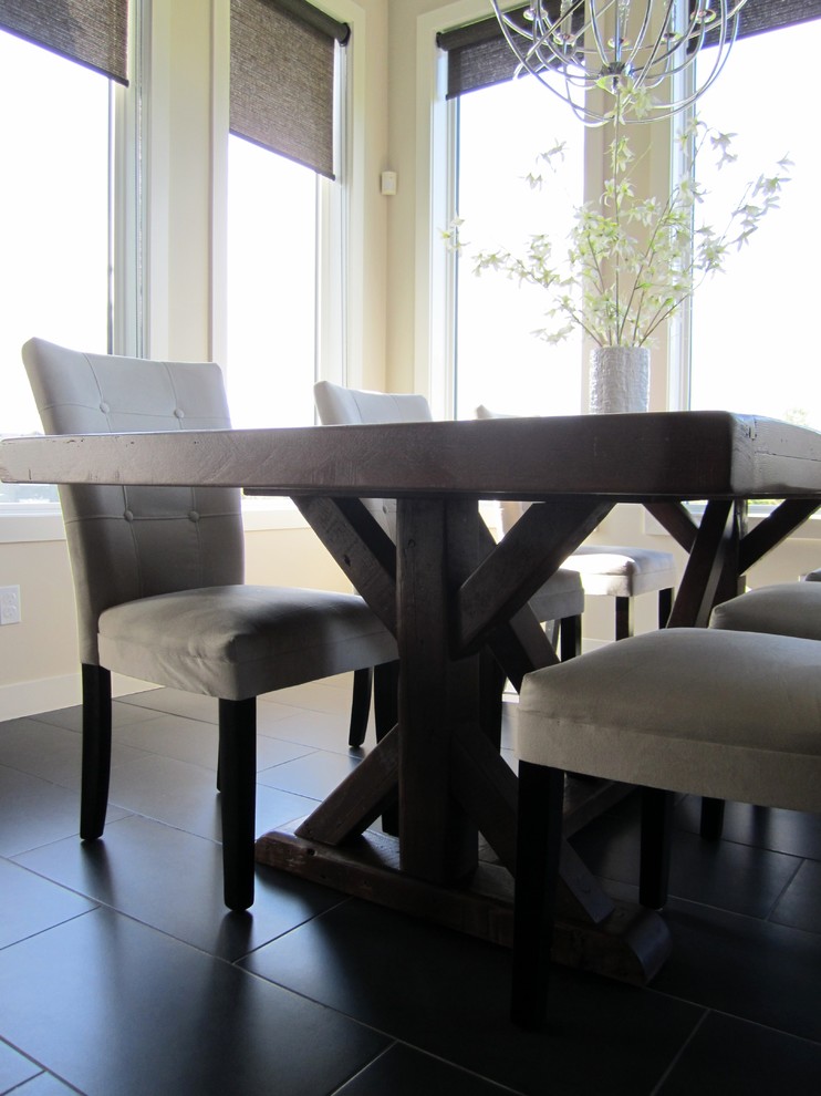 Example of a mountain style dining room design in Vancouver