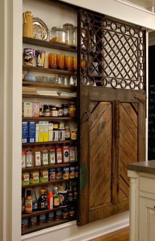 This is an example of a small country single-wall kitchen pantry in San Francisco.