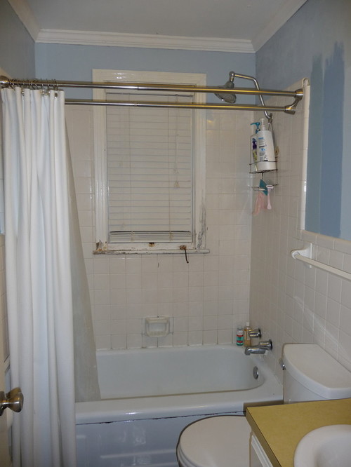 window over bathtub and in shower