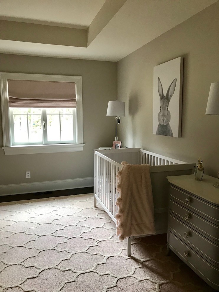 Design ideas for an expansive transitional nursery for girls in Other with beige walls, medium hardwood floors, brown floor and coffered.
