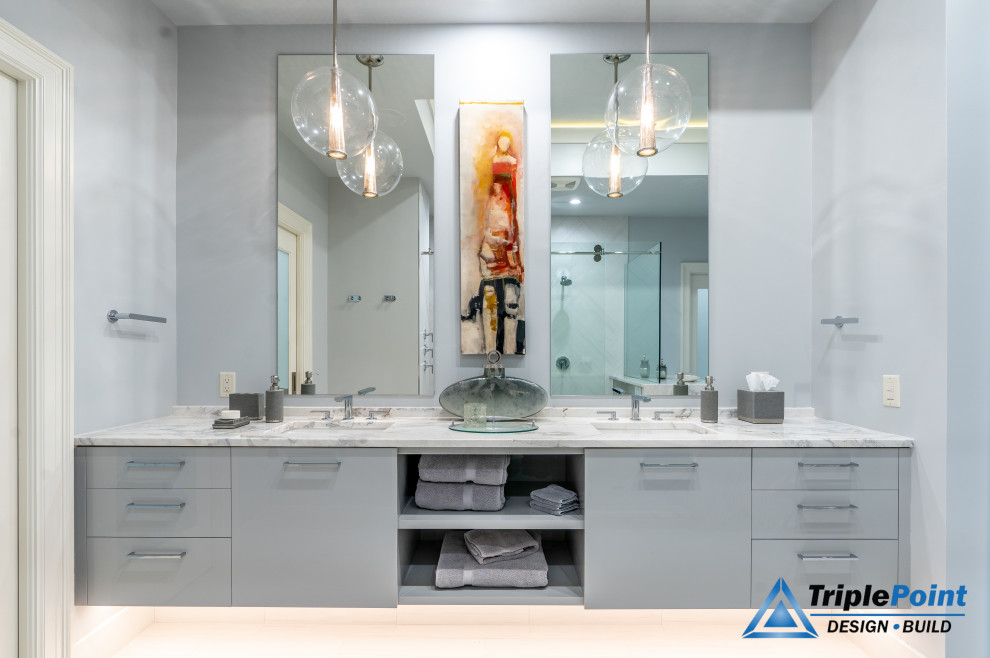 Inspiration for a large contemporary master bathroom in Tampa with flat-panel cabinets, grey cabinets, a corner shower, grey walls, wood-look tile, an undermount sink, granite benchtops, grey floor, a sliding shower screen, grey benchtops, a double vanity, a floating vanity, recessed and vaulted.