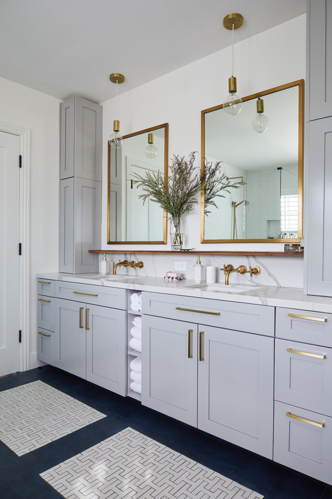 Photo of a transitional master bathroom in Los Angeles with shaker cabinets, grey cabinets, white walls, an undermount sink, black floor and white benchtops.