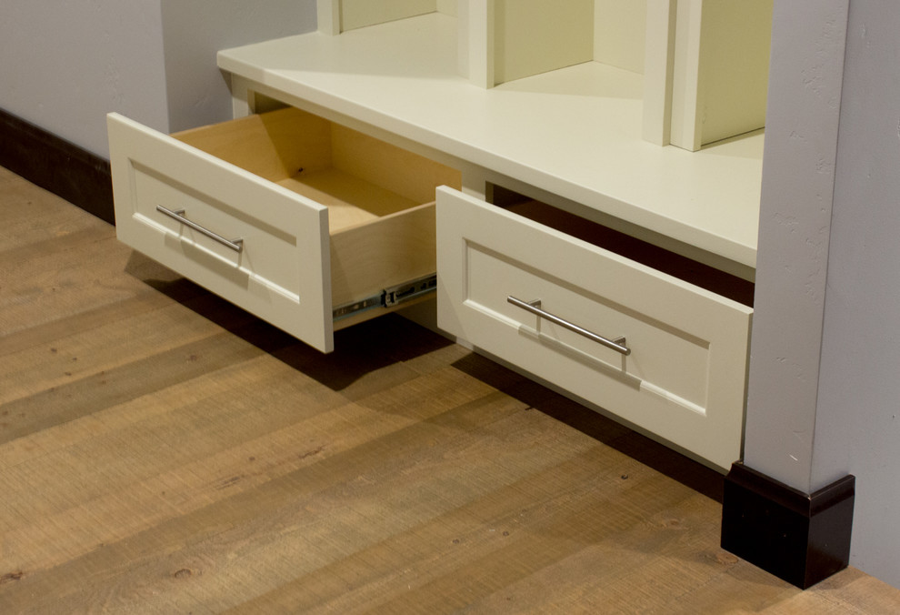 Mid-sized transitional single-wall medium tone wood floor and brown floor eat-in kitchen photo with an undermount sink, shaker cabinets, white cabinets, granite countertops, stainless steel appliances and an island