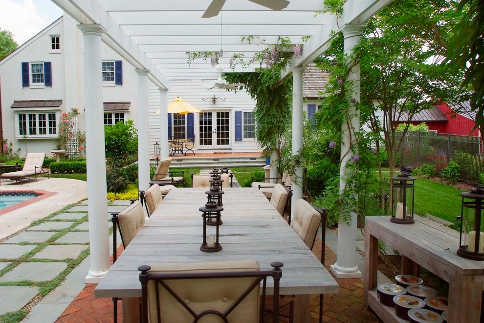 Photo of a traditional patio in Philadelphia with a pergola.