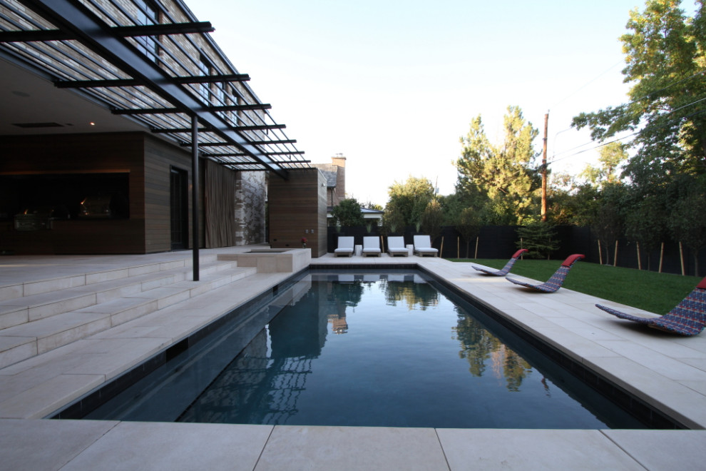Design ideas for a mid-sized contemporary backyard rectangular pool in Denver.
