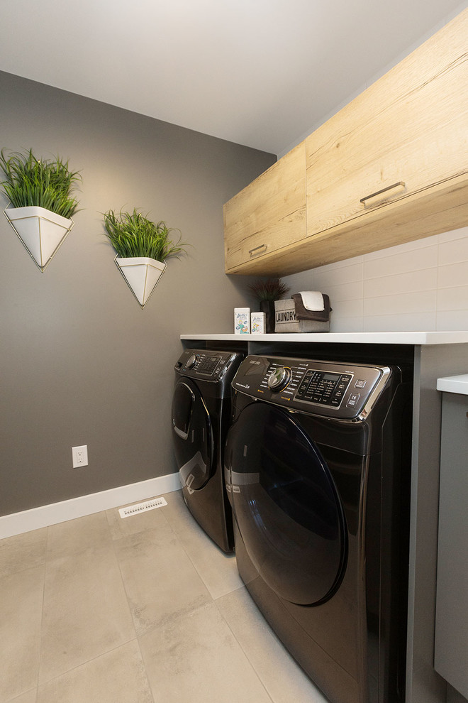 This is an example of a contemporary laundry room in Edmonton.
