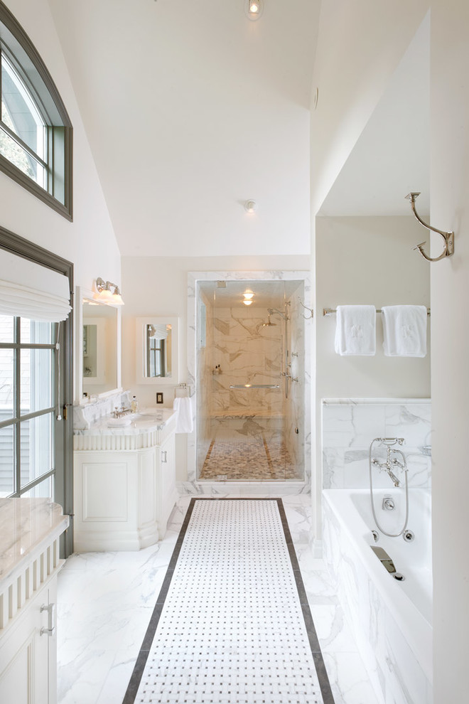 Inspiration for a traditional bathroom in Denver with recessed-panel cabinets, white cabinets, an alcove tub, an alcove shower and multi-coloured tile.