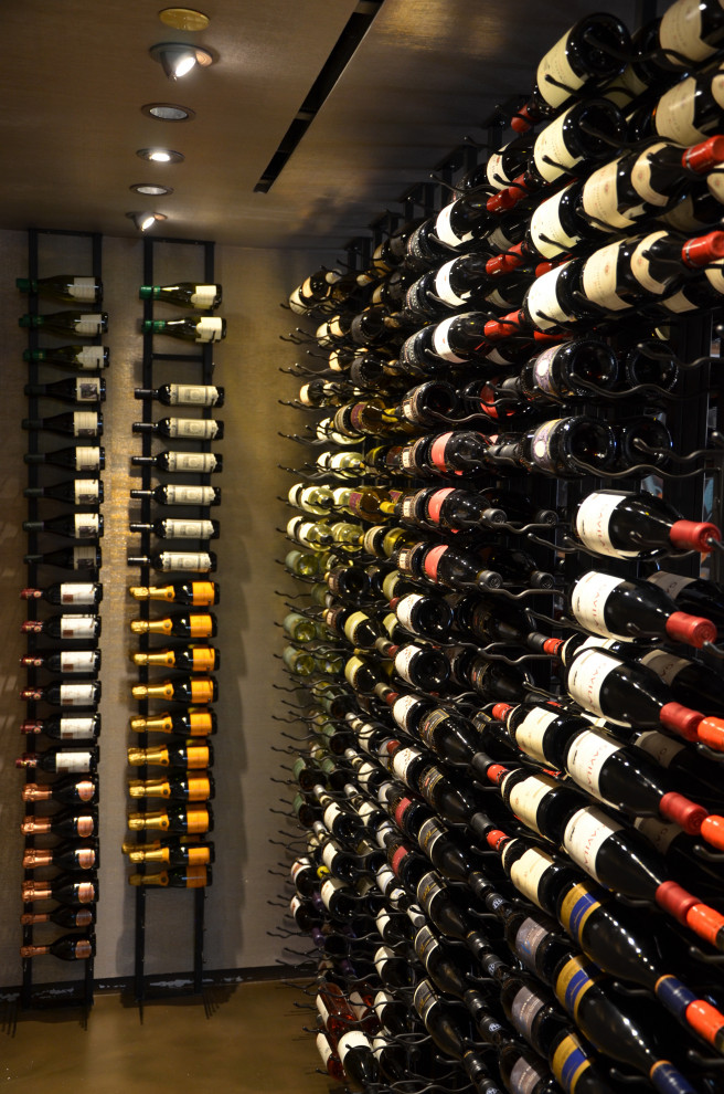 This is an example of a mid-sized contemporary wine cellar in Las Vegas.